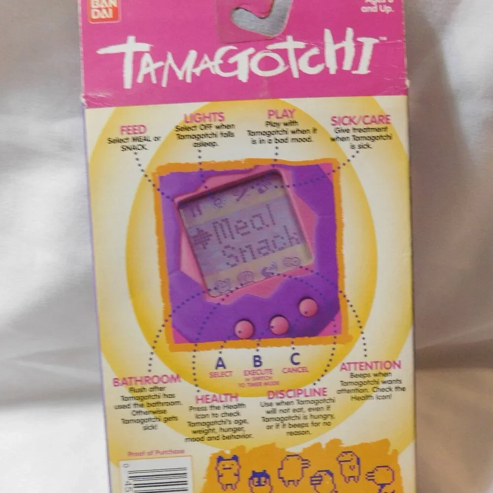 Bandai TAMAGOTCHI Electronic Virtual Reality Pet 1997 Purple